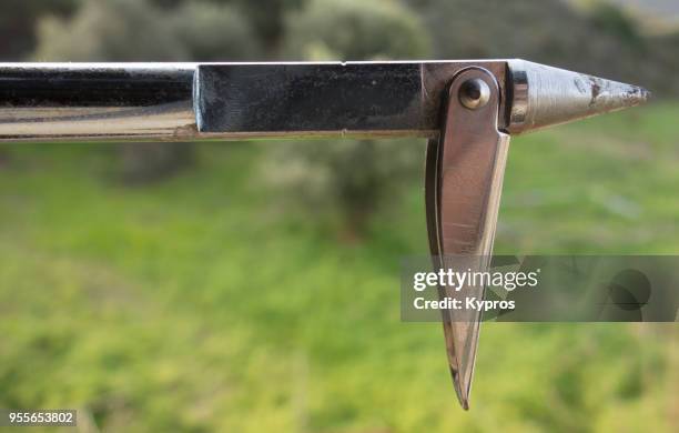 europe, greece, 2018: close up of spear fishing harpoon - harpoon stock pictures, royalty-free photos & images