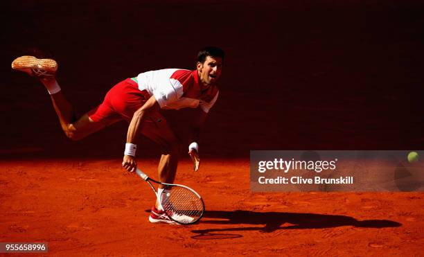 Novak Djokovic of Serbia in action against Kei Nishikori of Japan in their first round match during day three of the Mutua Madrid Open tennis...