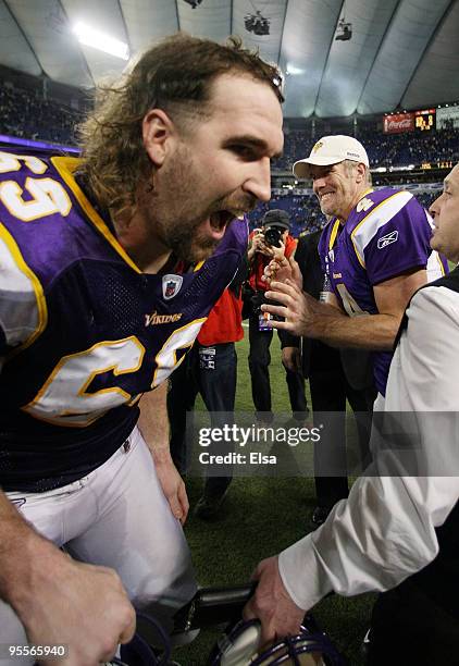 Brett Favre and Jared Allen of the Minnesota Vikings joke around after the game against the New York Giants on January 3, 2010 at Hubert H. Humphrey...