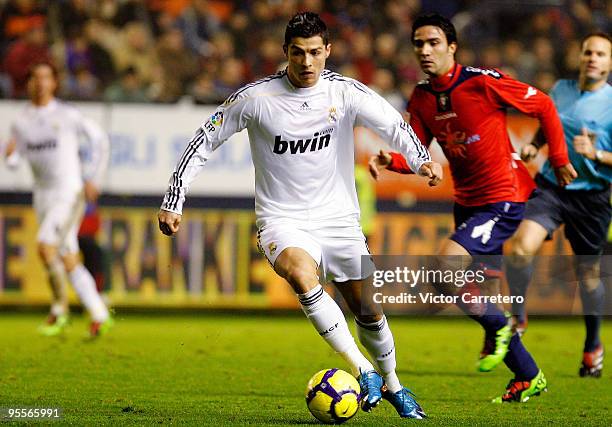 Cristiano Ronaldo of Real Madrid in action during the La Liga match between Osasuna and Real Madrid at Estadio Reyno de Navarra on January 3, 2010 in...