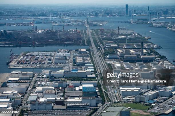 factory area in kawasaki city in japan daytime aerial view from airplane - kawasaki kanagawa prefecture stock-fotos und bilder
