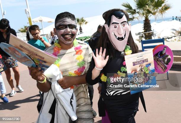 Children dressed as monsters after they attend a colourful photocall to launch a sneak peek of 'Hotel Transylvania 3' during the 71st Cannes Film...