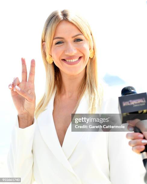 Voice actor Lesia Nikitiuk cruises into the 71st Cannes Film Festival for a colourful photocall with monster characters from the movie to launch a...