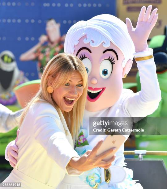 Voice actor Lesia Nikitiuk cruises into the 71st Cannes Film Festival for a colourful photocall with monster characters from the movie to launch a...