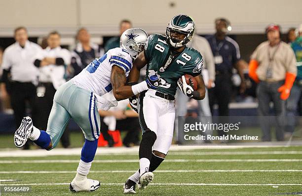Wide receiver Jeremy Maclin of the Philadelphia Eagles is tackled by Ken Hamlin of the Dallas Cowboys at Cowboys Stadium on January 3, 2010 in...