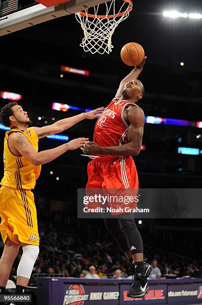 Joey Dorsey of the Rio Grande Valley Vipers gets to the hoop for a dunk and the foul against Keith Clark of the Los Angeles D-Fenders at Staples...