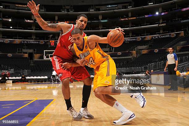 Diamon Simpson of the Los Angeles D-Fenders drives to the hoop past Ernest Scott of the Rio Grande Valley Vipers at Staples Center on January 3, 2010...