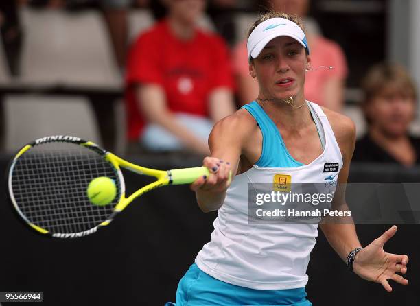 Yanina Wickmayer of Belgium plays a forehand in her first round match against Julia Goerges of Germany during day one of the ASB Classic at ASB...