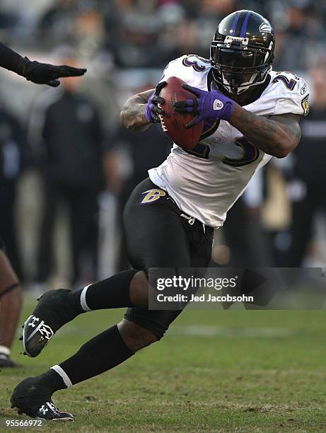 Willis McGahee of the Baltimore Ravens runs against the Oakland Raiders during an NFL game at Oakland-Alameda County Coliseum on January 3, 2010 in...