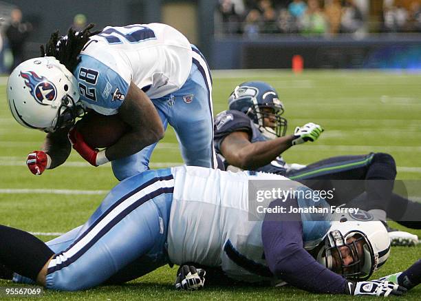 Chris Johnson of the Tennessee Titans scores a touchdown in the fourth quarter to beat the Seattle Seahawks 17-13 at Qwest Field on January 3, 2010...