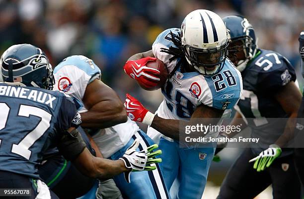 Chris Johnson of the Tennessee Titans runs with the ball against the Seattle Seahawks 17-13 at Qwest Field on January 3, 2010 in Seattle, Washington....