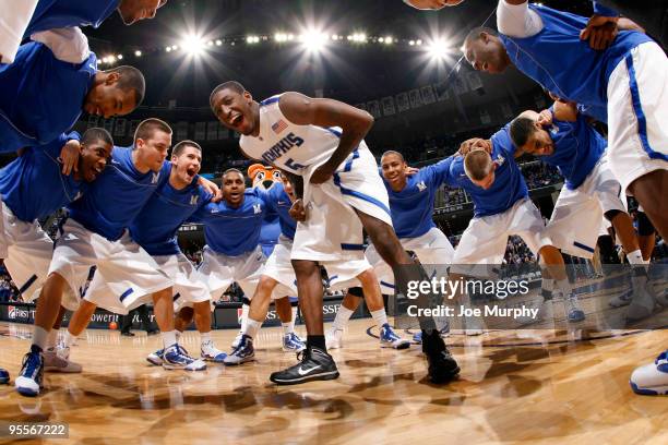 Willie Kemp of the Memphis Tigers leads his team in a pregame huddle against the Houston Baptist Huskies on January 3, 2010 at FedExForum in Memphis,...