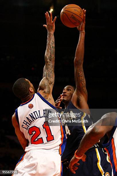 Solomon Jones of the Indiana Pacers shoots over Wilson Chandler of the New York Knicks at Madison Square Garden January 3, 2010 in New York City....