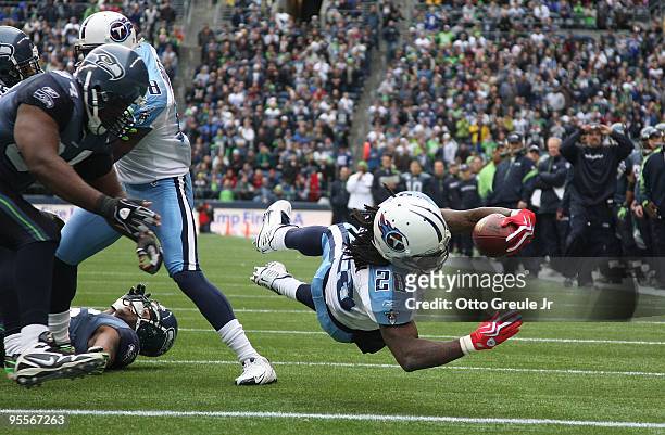 Running back Chris Johnson of the Tennessee Titans rushes for a touchdown in the first quarter against the Seattle Seahawks on January 3, 2010 at...