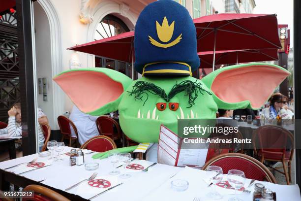 Monster characters pose for a colourful photocall to launch sneak peek of 'Hotel Transylvania 3' on May 7, 2018 in Cannes, France.