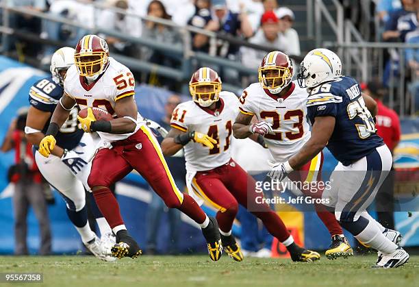 Rocky McIntosh of the Washington Redskins carries the ball following an interception in the third quarter against the San Diego Chargers at Qualcomm...