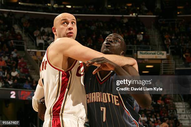 Zydrunas Ilgauskas of the Cleveland Cavaliers battles for the rebound with DeSagana Diop of the Charlotte Bobcats on January 3, 2010 at The Quicken...