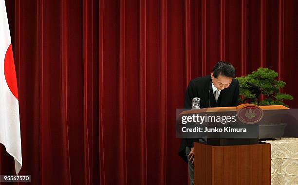 Japanese Prime Minister Yukio Hatoyama bows during the new year press conference at Hatoyama's official residence on January 4, 2010 in Tokyo, Japan....