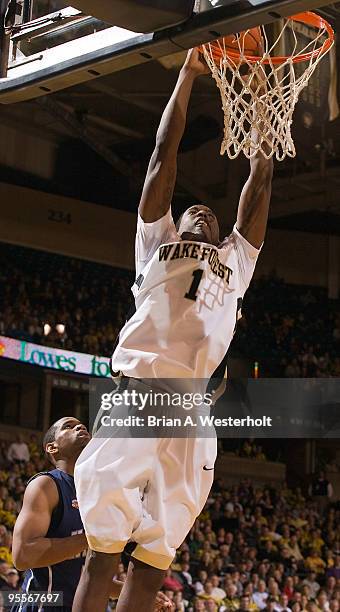 Al-Farouq Aminu of the Wake Forest Demon Deacons slams home two of his 26 points during second half action against the Xavier Musketeers at the Joel...