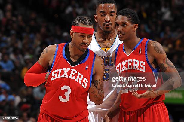 Allen Iverson and Louis Williams of the Philadelphia 76ers talk while J.R. Smith of the Denver Nuggets listens in on January 3, 2010 at the Pepsi...