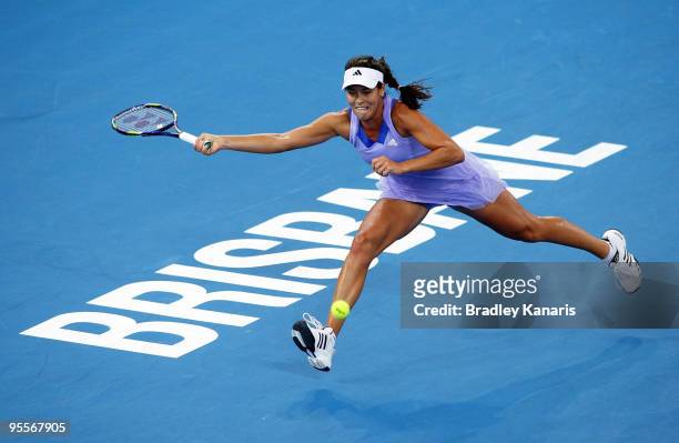 Ana Ivanovic of Serbia stretches out as she attempts to play a forehand in her first round match against Jelena Dokic of Australia during day two of...