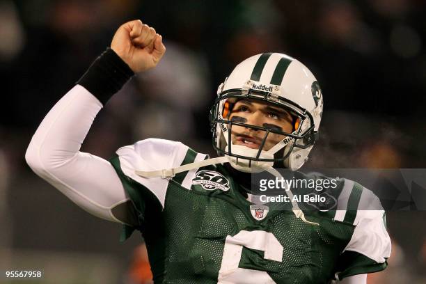 Quarterback Mark Sanchez of the New York Jets celebrates a touchdown by Thomas Jones in the fourth quarter of the game against the Cincinnati Bengals...