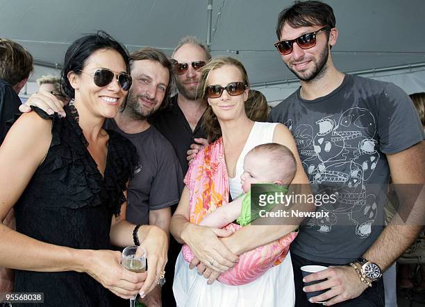 Australian actor Rachel Griffiths with her baby 6 month old daughter Clementine and former Australian swimmer Ian Thorpe pose at a New Year's Day...