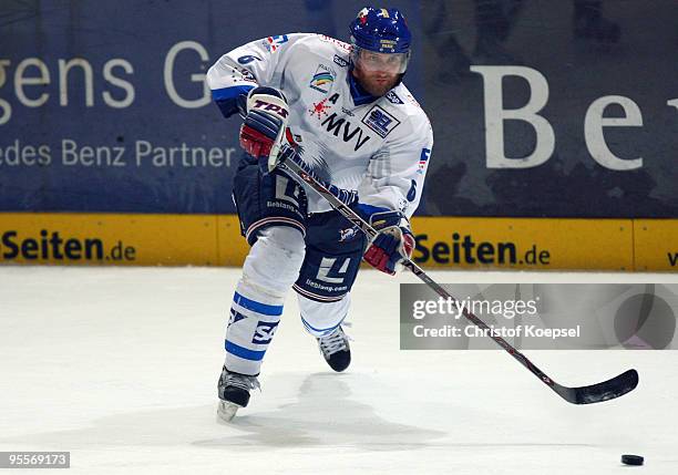 Sven Butenschoen of Adler Mannheim shoots the puck during the DEL match between Iserlohn Roosters and Adler Mannheim at the Ice Sports Hall Iserlohn...