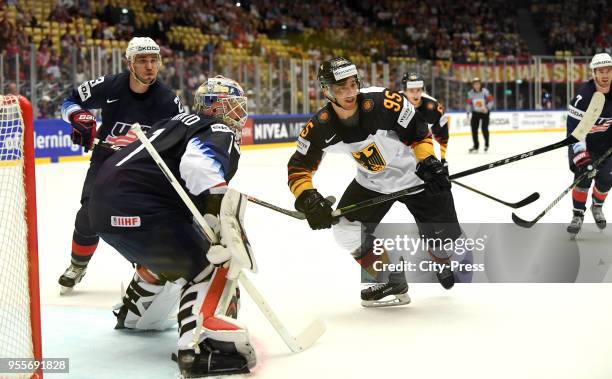 Alec Martinez, Keith Kinkaid of Team USA and Frederik Tiffels of Team Germany during the game between USA and Germany on May 7, 2018 in Herning,...