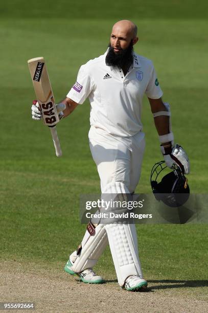 Hashim Amla of Hampshire celebrates his century during day four of the Specsavers County Championship Division One match between Nottinghamshire and...