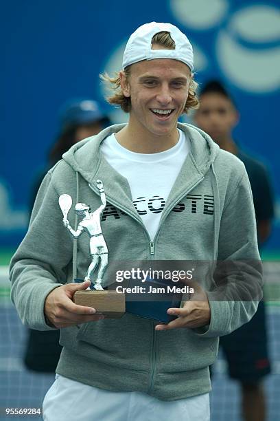 Tennis player Denis Kudla poses with the trophy of the 32nd International Casablanca Junior Tennis Cup at Casablanca Club on January 03, 2009 in...