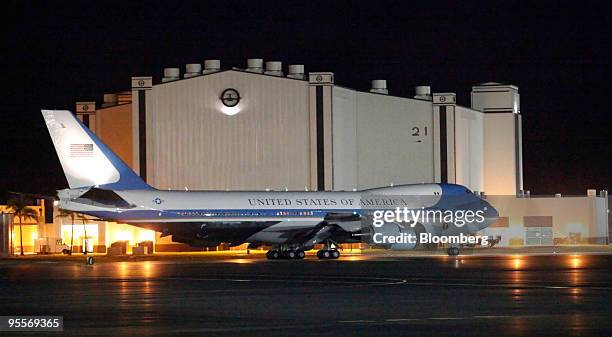 Air Force One taxis at Hickam Air Force Base in Honolulu, Hawaii, U.S., on Sunday, Jan. 3, 2010. Obama said in his weekly radio and internet address...