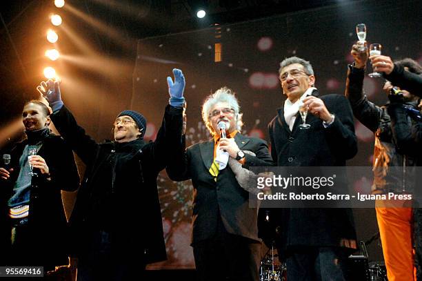 Italian Musician Lucio Dalla, showman Patrizio Roversi and major Flavio Delbono toasting the new year on December 31, 2009 in Bologna, Italy.