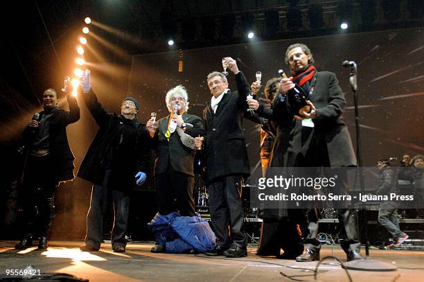 Italian Musician Lucio Dalla, showman Patrizio Roversi and major Flavio Delbono toasting the new year on December 31, 2009 in Bologna, Italy.