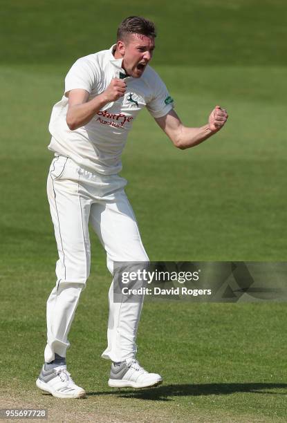 Jake Ball of Nottinghamshire celebrates after taking the wicket of Kyle Abbott during day four of the Specsavers County Championship Division One...