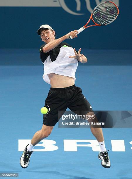 John Millman of Australia plays a forehand in his first round match against Radek Stepanek of Czechoslovakia during day two of the Brisbane...