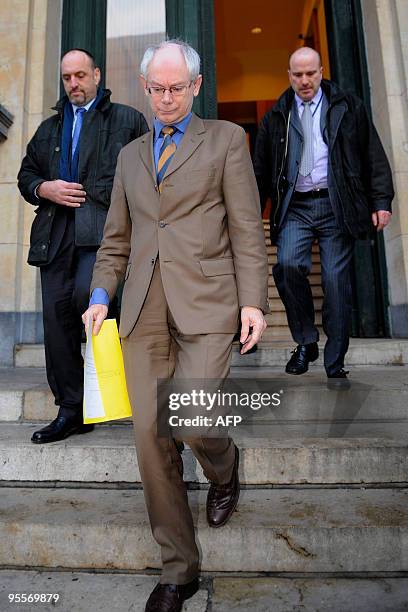 European Council President Herman Van Rompuy is followed by his bodyguards on January 4, 2010 in Brussels after opening the first trading day of the...