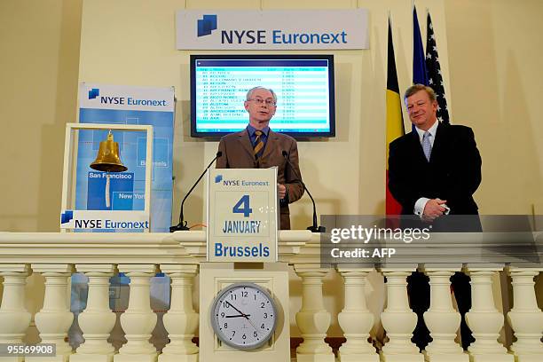 European Council President Herman Van Rompuy stands next to Chairman of Euronext Brussels Vincent Van Dessel on January 4, 2010 in Brussels as he...