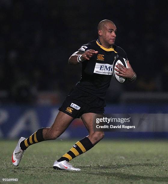 Tom Varndell of Wasps runs with the ball during the Guinness Premiership match between London Wasps and Newcastle Falcons at Adams Park on January 3,...