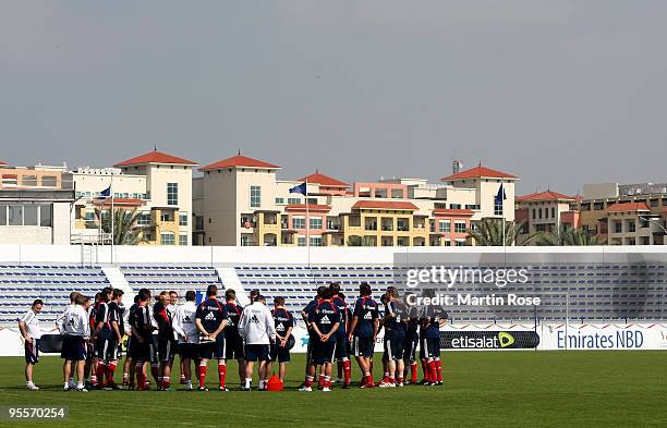 The team of Bayern Muenchen discuss during the FC Bayern Muenchen training session at the Al Nasr training ground on January 4, 2010 in Dubai, United...