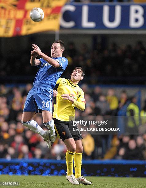 Chelsea's Captain John Terry vies with Watford's Danny Graham during their FA Cup match at home to Chelsea at Stamford Bridge football stadium in...