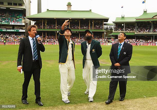 Australian captain Ricky Ponting tosses the coin as Pakistan captain Mohammad Yousuf looks on during day one of the Second Test match between...