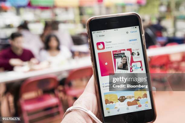 The Match Group Inc. Tinder dating application is displayed in the App Store on an Apple Inc. IPhone in an arranged photograph taken in the Brooklyn...