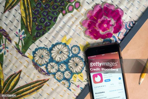 The Match Group Inc. Tinder dating application is displayed in the App Store on an Apple Inc. IPhone in an arranged photograph taken in the Brooklyn...