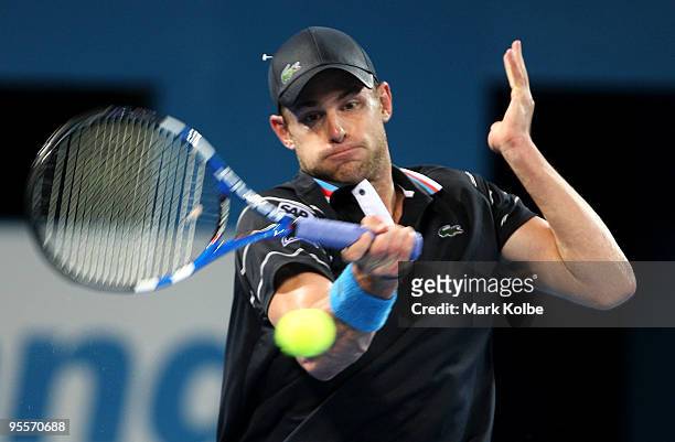 Andy Roddick of the USA plays a forehand in his first round match against Peter Luczak of Australia during day two of the Brisbane International 2010...