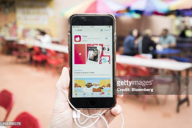 The Match Group Inc. Tinder dating application is displayed in the App Store on an Apple Inc. IPhone in an arranged photograph taken in the Brooklyn...