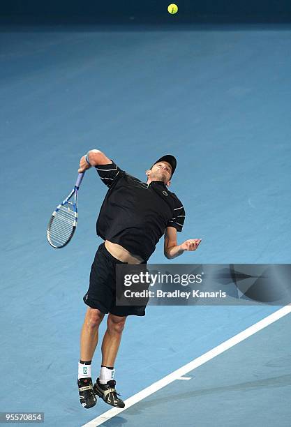 Andy Roddick of the USA serves in his first round match against Peter Luczak of Australia during day two of the Brisbane International 2010 at...