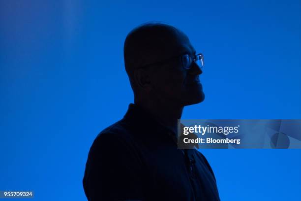 Satya Nadella, chief executive officer of Microsoft Corp., watches a video during the Microsoft Developers Build Conference in Seattle, Washington,...