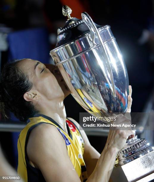 May 7, 2018 -- Gozde Kirdar, captain of Turkey's Vakifbank, kisses the trophy after winning the 2018 CEV Volleyball Champions League final against...