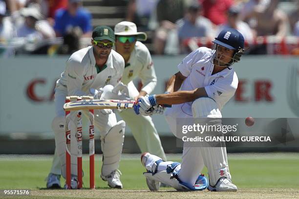 English batsman Alastair Cook plays a shot on January 4, 2010 during the second day of the third Test match between South Africa and England at the...